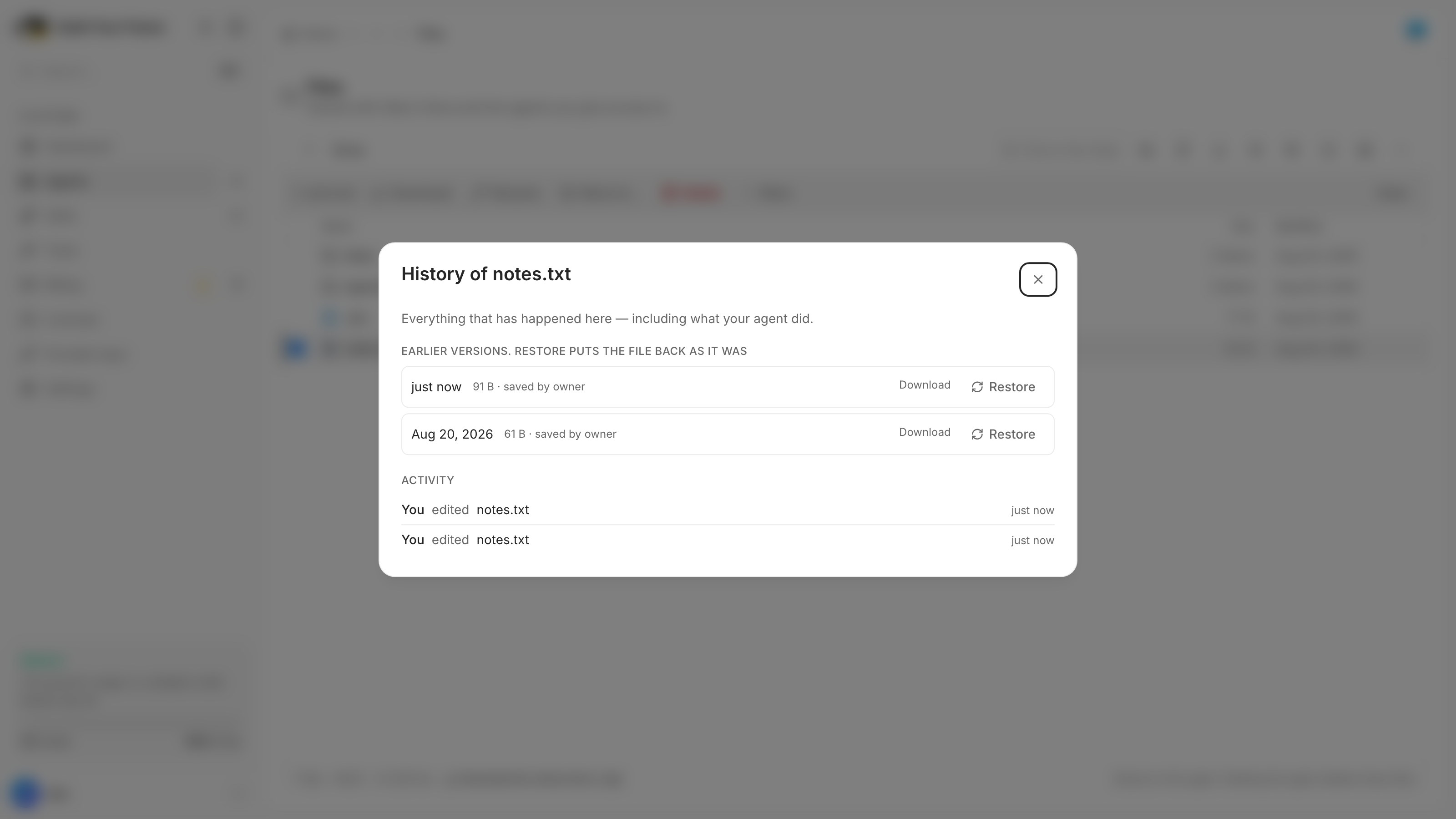 The history dialog for notes.txt: two earlier versions each offering Download and Restore, above an activity list showing who edited the file and when